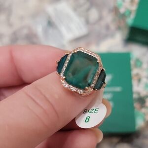 Green and Gold Ring with Halo Design